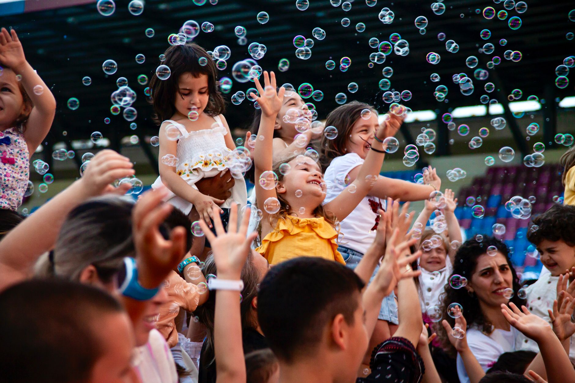 Excited healthy kids enjoying magic party